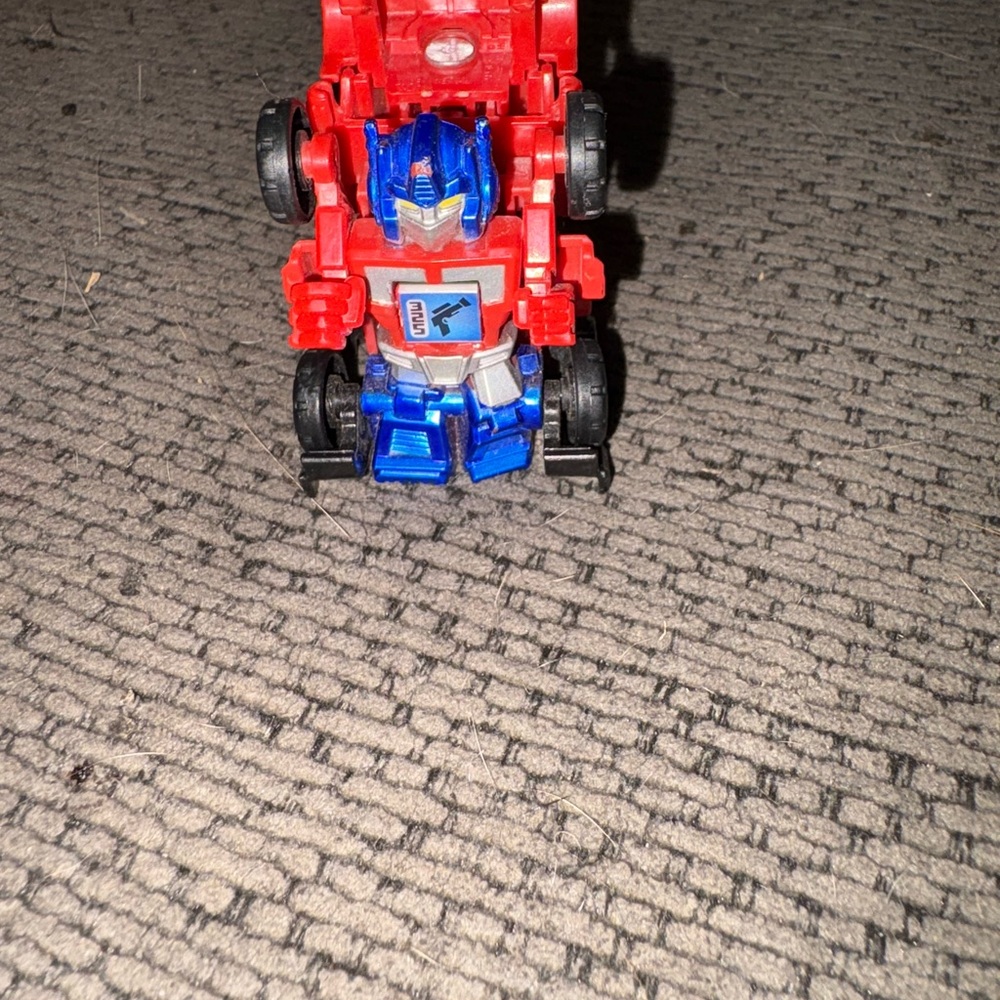 Hasbro Red and Blue Transforming Robot Truck Action Figure